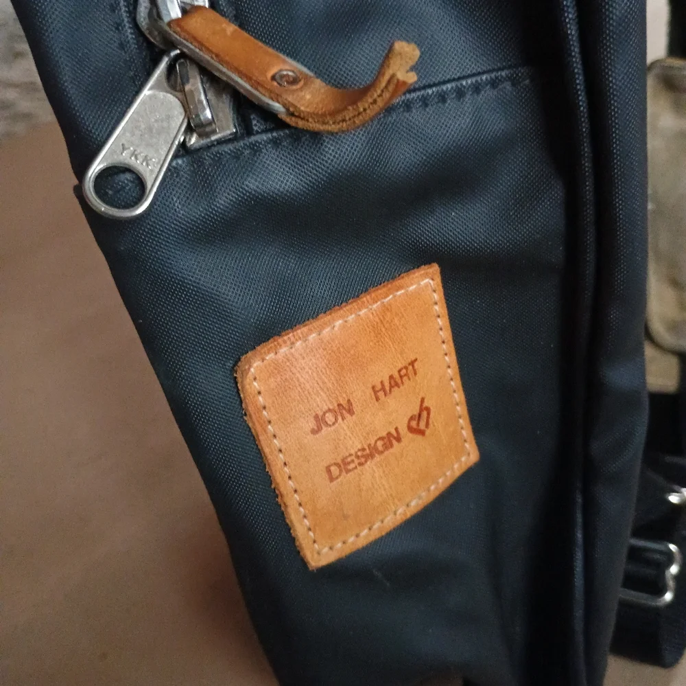 Jon Hart Design Black And Tan Coated Canvas Backpack With Monogram Travel Bag